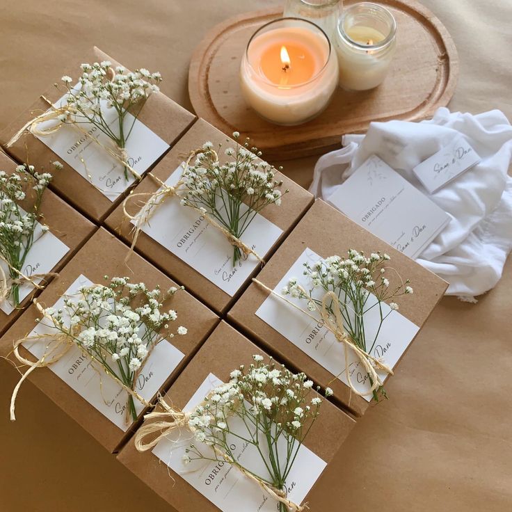 the table is set up with cards and flowers