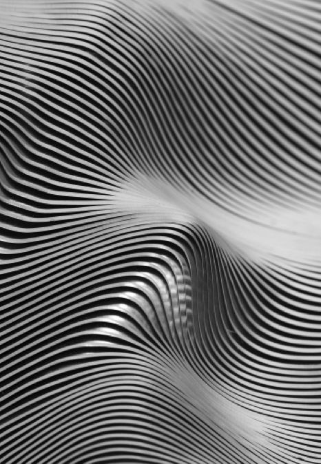 an abstract black and white photo with wavy lines