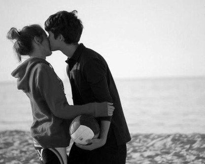 a man and woman kissing on the beach with an ocean in the background that says, will you even look back when you think of me?