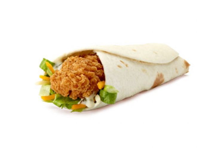 a burrito filled with chicken and lettuce