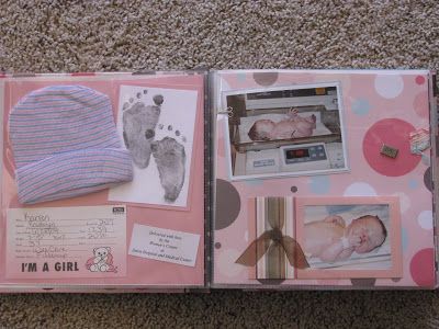 a baby's hand and foot print in a pink book with pictures on it