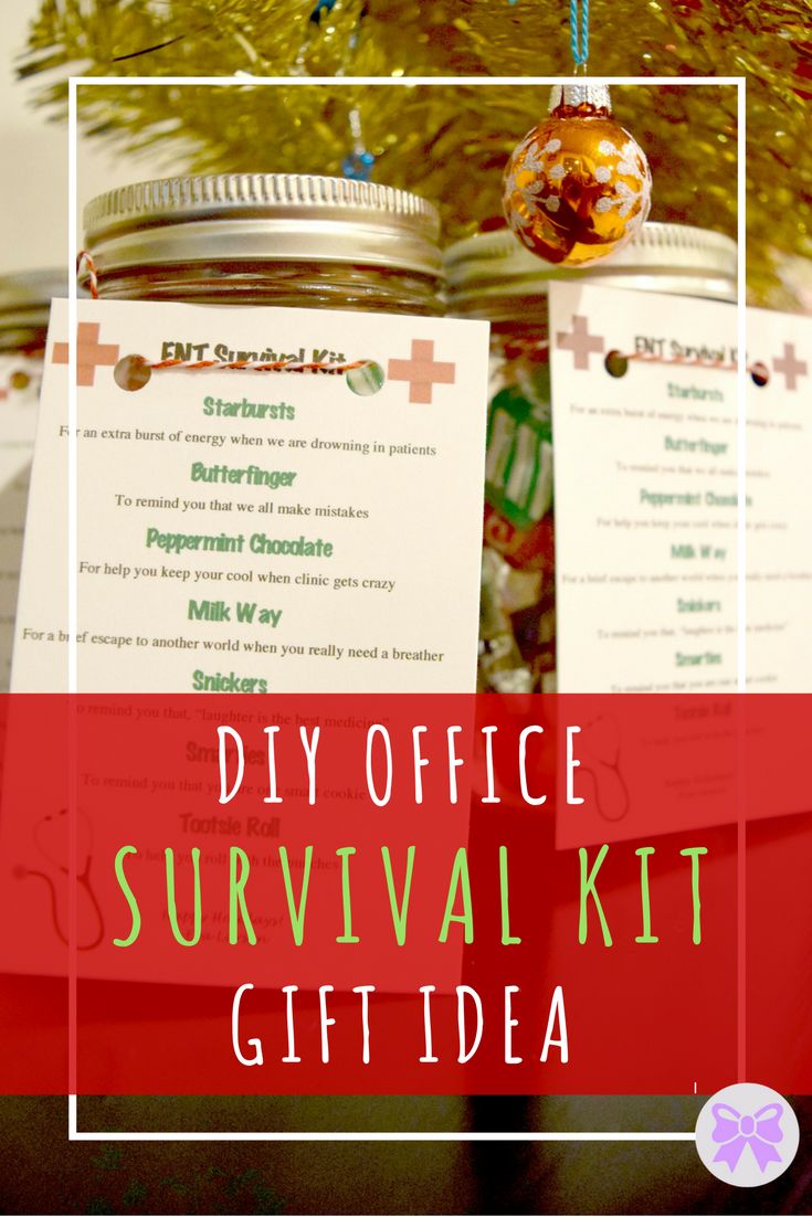 the diy office survival kit is hanging from a christmas tree