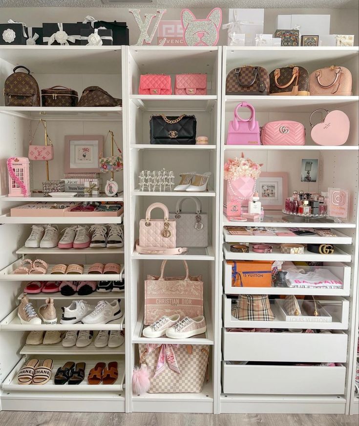 a closet filled with lots of different types of purses and handbags on shelves