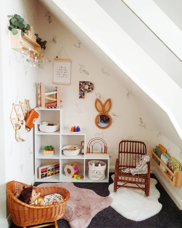 a child's room with toys and bookshelves