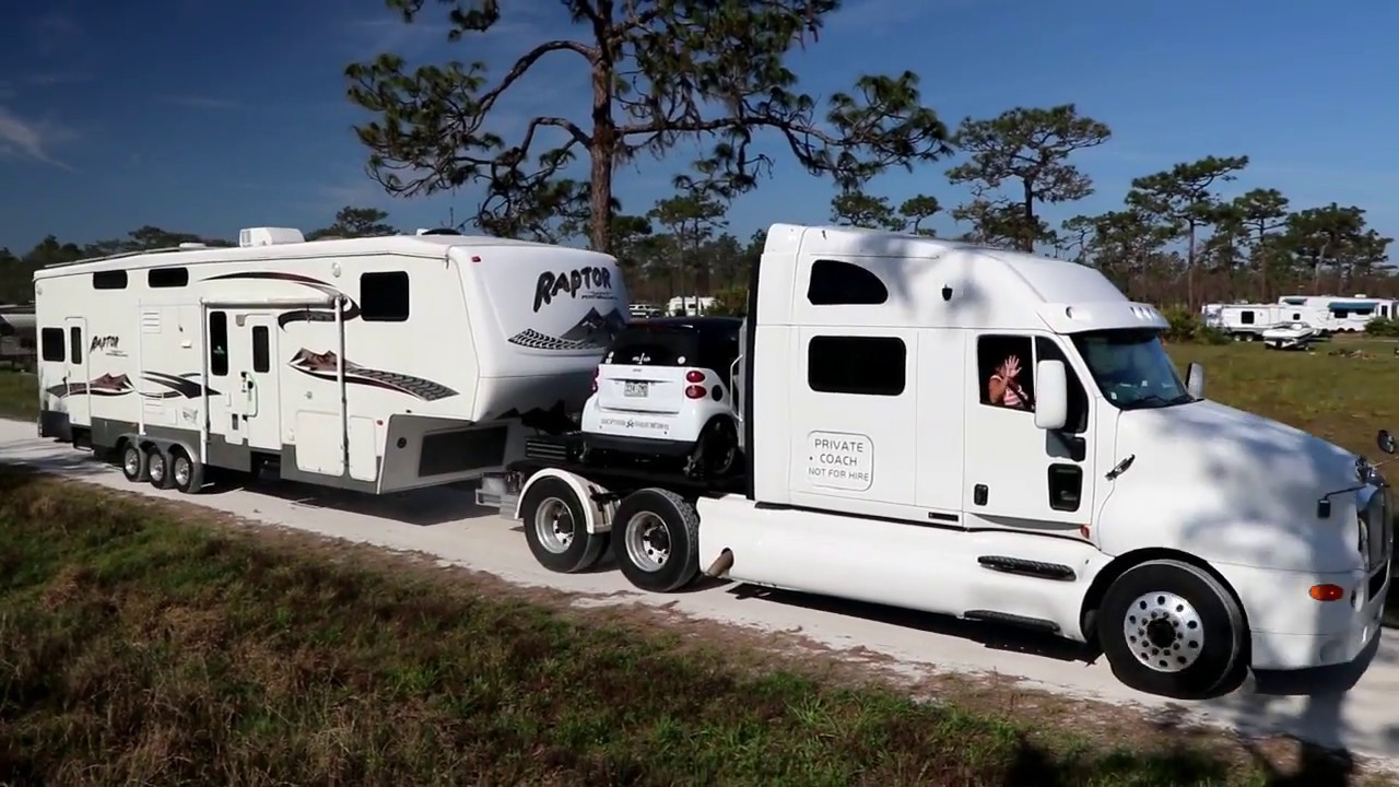 Smart Car In Bed Of Truck