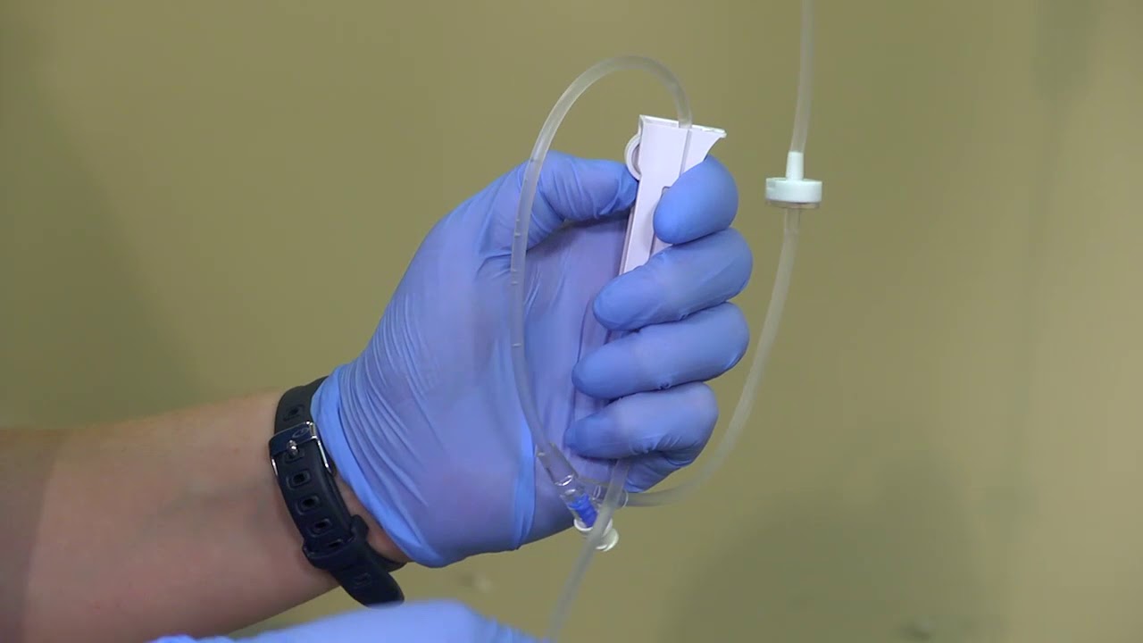 Changing Intravenous Tubing and Fluids - YouTube