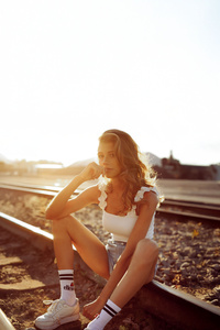 Girl Posing On Train Tracks (480x854) Resolution Wallpaper