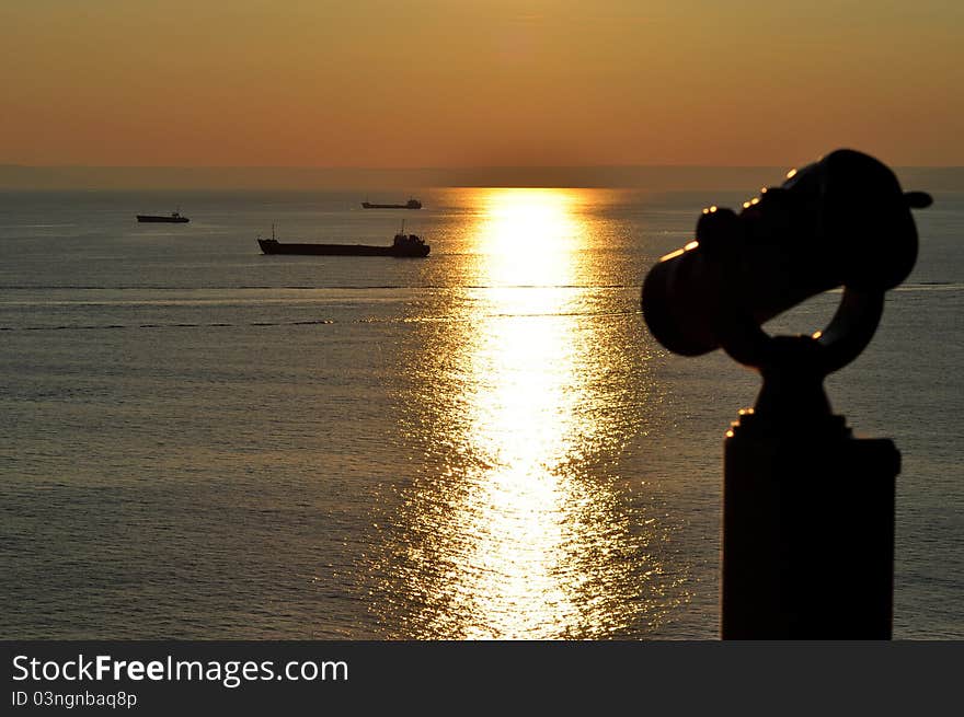 A ciew at the sea and the ships sailing in it. A ciew at the sea and the ships sailing in it