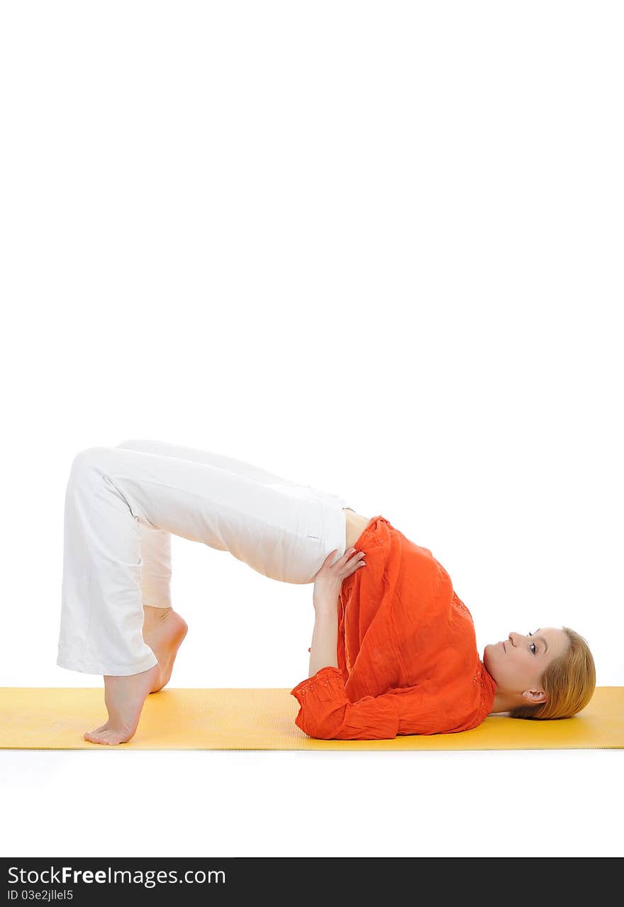 Series or yoga photos. young woman doing yoga pose on yellow pilates mat