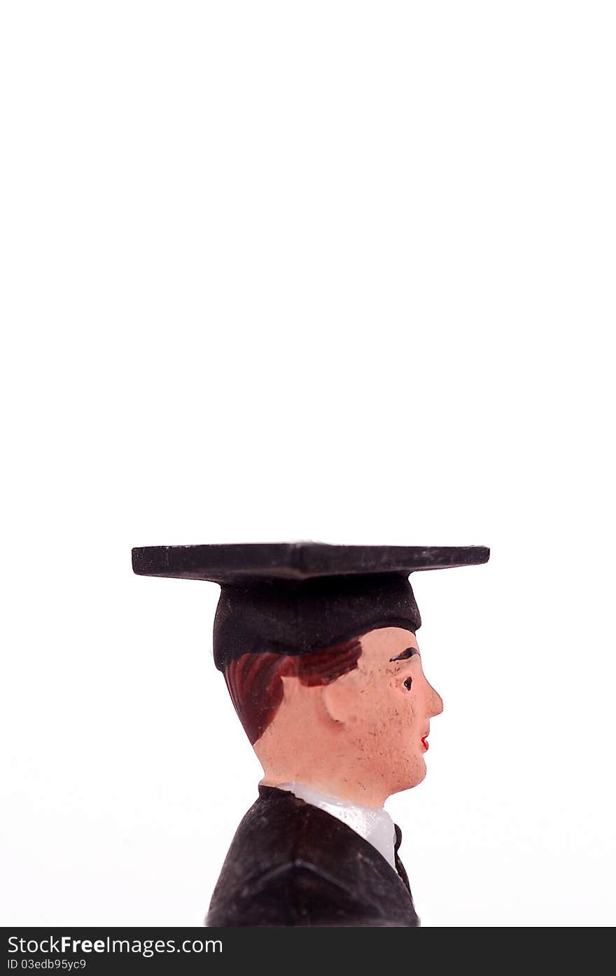 Graduate figurine isolated on a white background