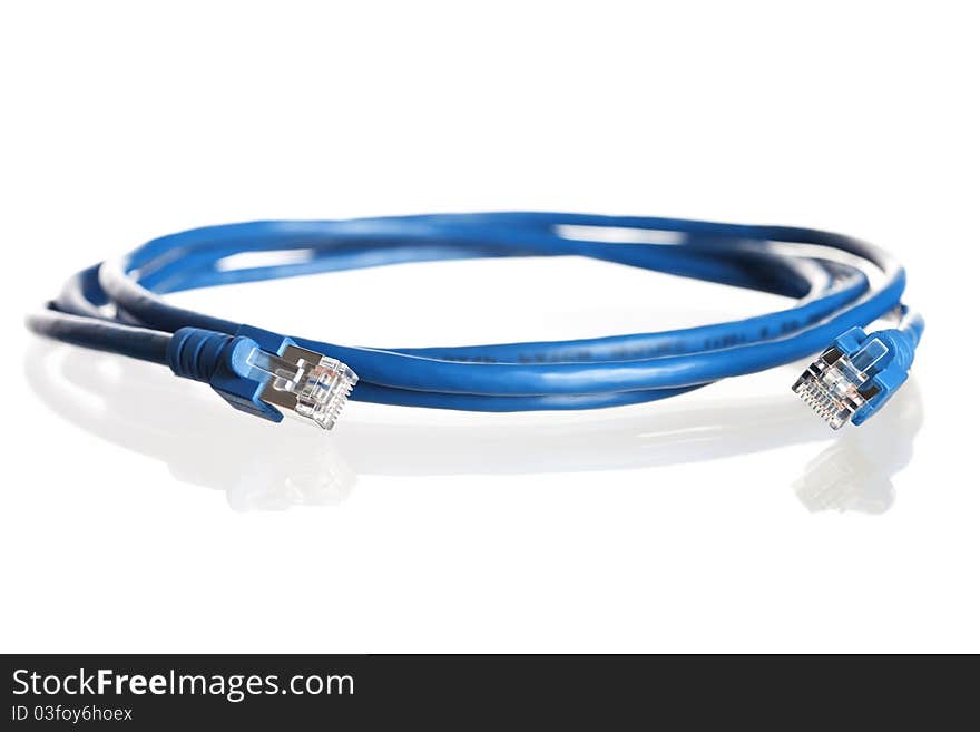 Close up of blue wound-up network cable with reflection, isolated on white background. Close up of blue wound-up network cable with reflection, isolated on white background.