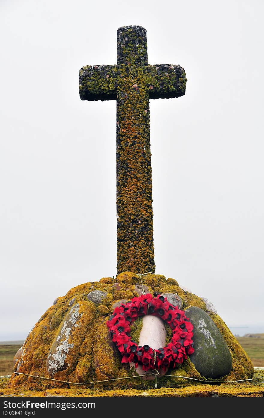 Memorial cross in Island Stroma, Caithness, Scotland, U.K  Stroma was once a populous island in the Pentland Firth, finally deserted in 1962 now it&#x27;s only inhabitants are a herd of sheep and various other wildlife. The people of Stroma were very close-knit and noted on several occasions for their striking manner and self-sufficiency. &#x22;From their political situation, and the simplicity, sobriety and industry, natural to them, there are perhaps few islanders on earth happier than those of Stroma.&#x22; Most people lived in single-storey houses which had two main rooms, called the &#x27;but&#x27; and &#x27;ben&#x27;. In these houses, there was usually a small bedroom &#x28;called the &#x27;closet&#x27;&#x29; and a porch also. The &#x27;but&#x27; was the living room where all everyday family life took place; the &#x27;ben&#x27; however was only used on special occasions, like when visitors came. Each room had box-beds, these were often closed in by folding doors or curtains. Wooden boards were covered with a layer of straw and a chaff filled mattress, both were renewed every year. The pillows were stuffed with the feathers of the croft chickens which were killed, plucked then eaten &#x28;little went to waste&#x29;, blankets made of sheep&#x27;s fleece were made at the mill; together this made a very cosy bed. The &#x27;but&#x27; held a stove and oven, along with a larder and crockery dresser. The stove and oven were the main means of heating in the croft house, all. Memorial cross in Island Stroma, Caithness, Scotland, U.K  Stroma was once a populous island in the Pentland Firth, finally deserted in 1962 now it&#x27;s only inhabitants are a herd of sheep and various other wildlife. The people of Stroma were very close-knit and noted on several occasions for their striking manner and self-sufficiency. &#x22;From their political situation, and the simplicity, sobriety and industry, natural to them, there are perhaps few islanders on earth happier than those of Stroma.&#x22; Most people lived in single-storey houses which had two main rooms, called the &#x27;but&#x27; and &#x27;ben&#x27;. In these houses, there was usually a small bedroom &#x28;called the &#x27;closet&#x27;&#x29; and a porch also. The &#x27;but&#x27; was the living room where all everyday family life took place; the &#x27;ben&#x27; however was only used on special occasions, like when visitors came. Each room had box-beds, these were often closed in by folding doors or curtains. Wooden boards were covered with a layer of straw and a chaff filled mattress, both were renewed every year. The pillows were stuffed with the feathers of the croft chickens which were killed, plucked then eaten &#x28;little went to waste&#x29;, blankets made of sheep&#x27;s fleece were made at the mill; together this made a very cosy bed. The &#x27;but&#x27; held a stove and oven, along with a larder and crockery dresser. The stove and oven were the main means of heating in the croft house, all