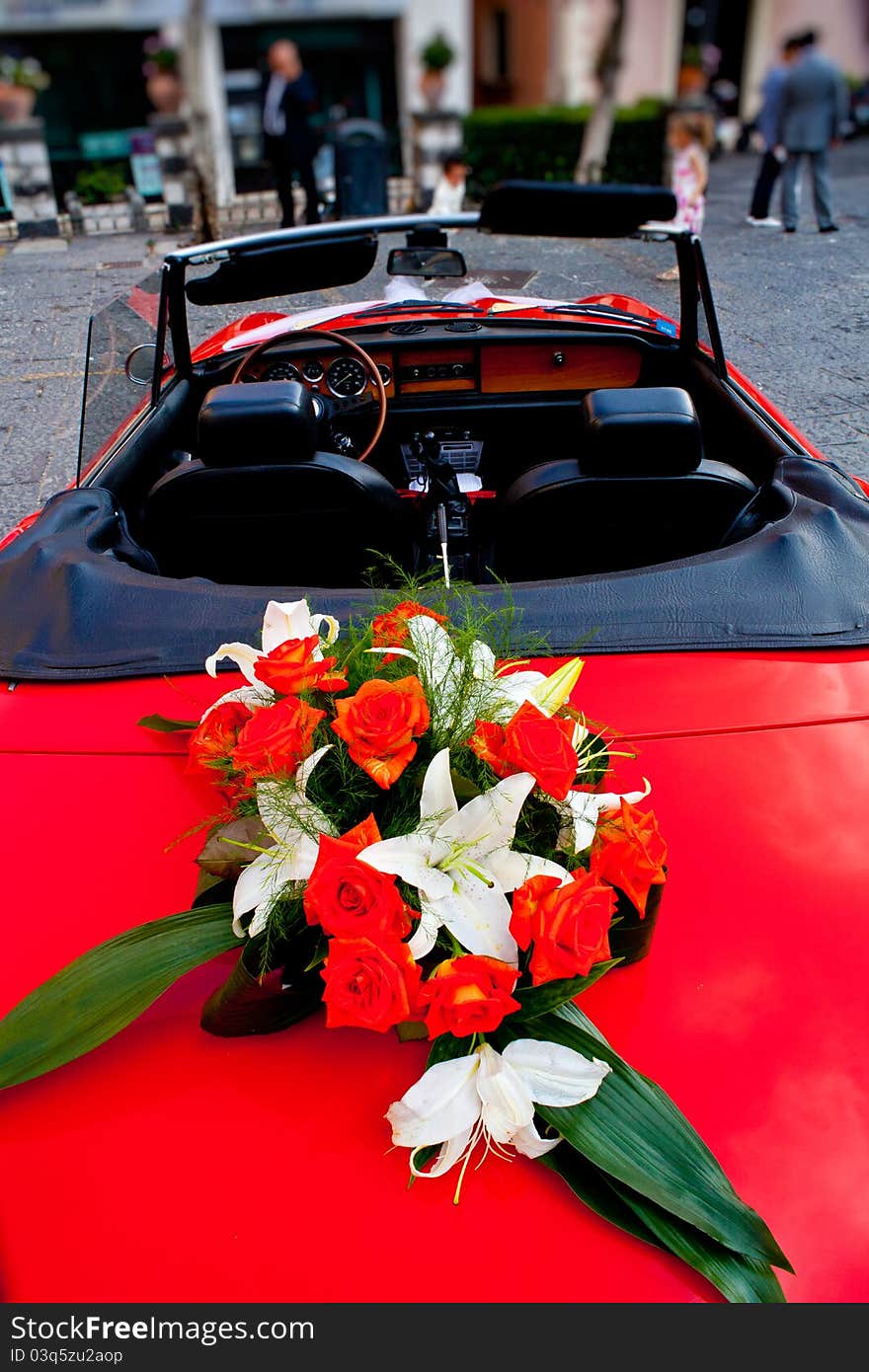 Flower's bouquet on a vintage red car. Flower's bouquet on a vintage red car