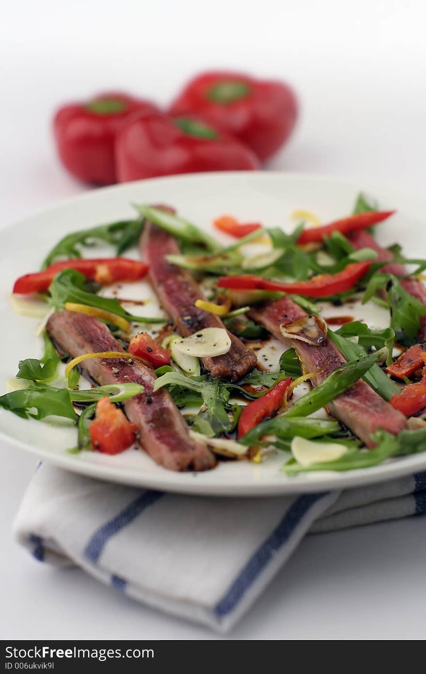 Beef Carpaccio; 3 capsicum, shallow DOF, tall