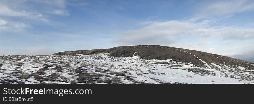 Early snow on the top of carpathian mountain