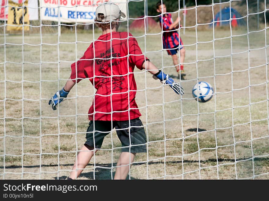 A penalty between two boys. A penalty between two boys