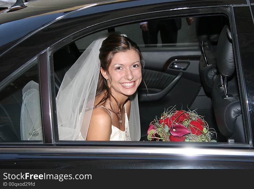 Young bride posing in the wedding day. Young bride posing in the wedding day