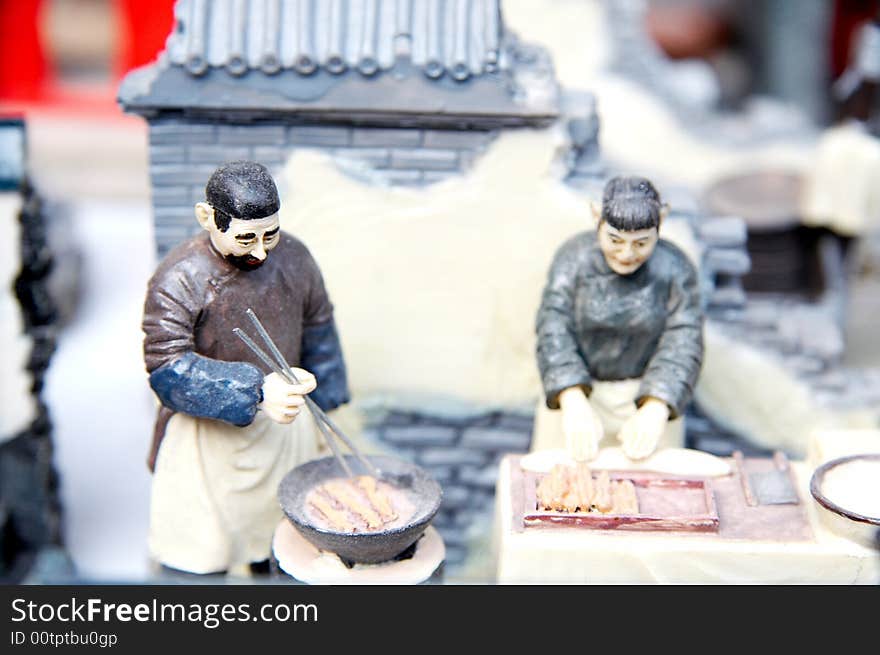 Chinese cartoon figurine,businessmen saling food in old Beijin street. porcelain,traditional,handmade. Chinese cartoon figurine,businessmen saling food in old Beijin street. porcelain,traditional,handmade.