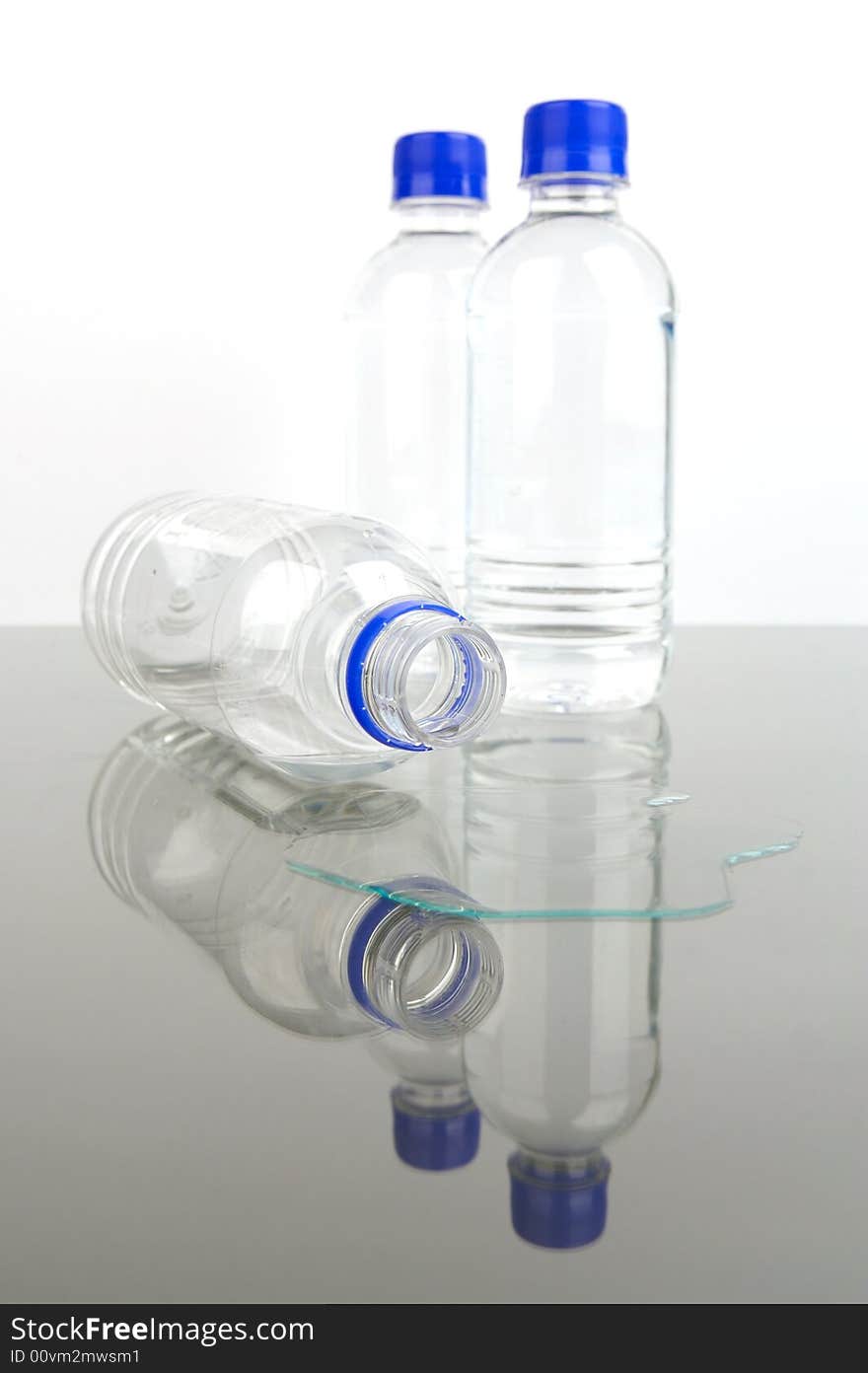 Bottled drinking water isolated against a white background. Bottled drinking water isolated against a white background