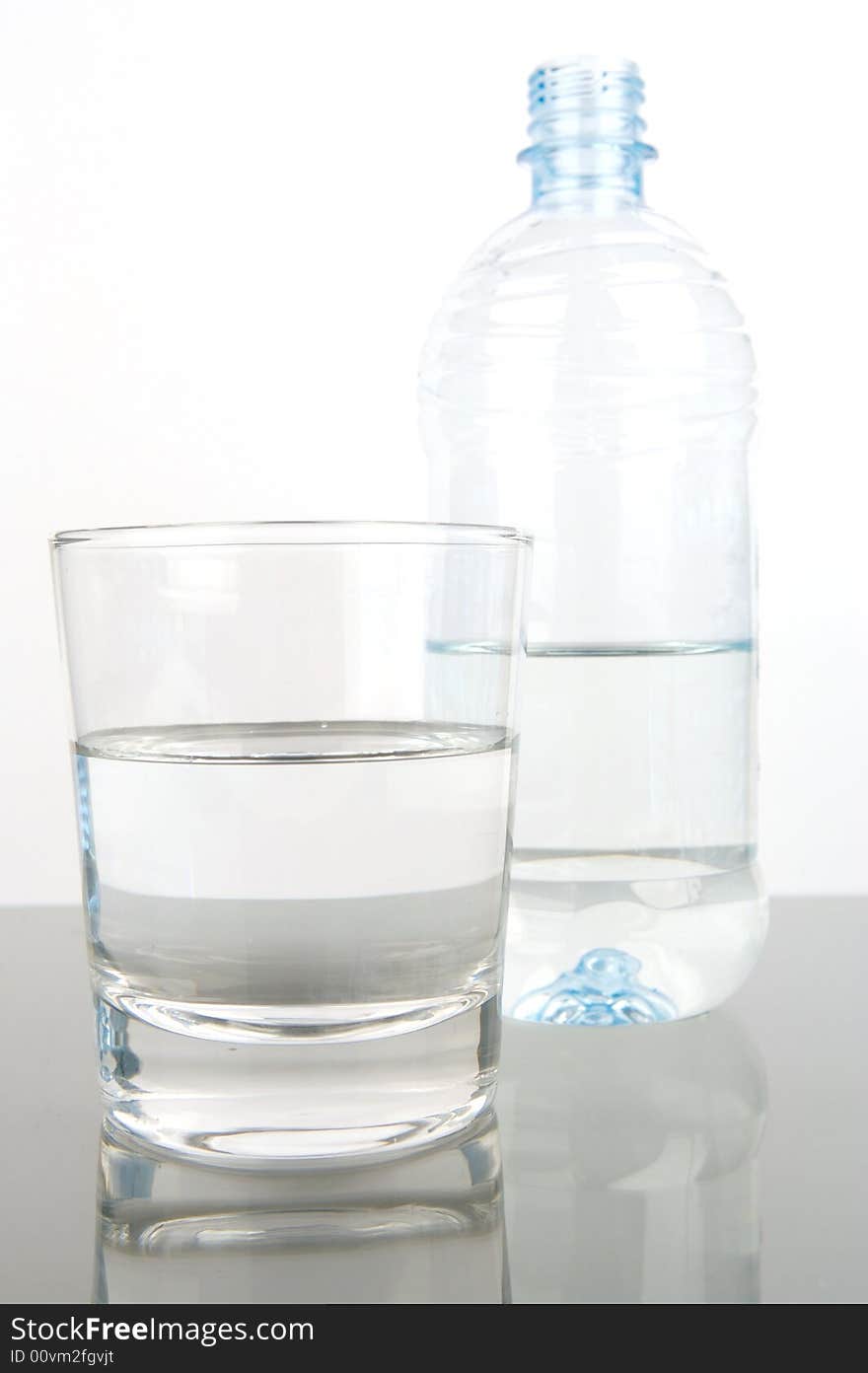 Bottled drinking water isolated against a white background. Bottled drinking water isolated against a white background