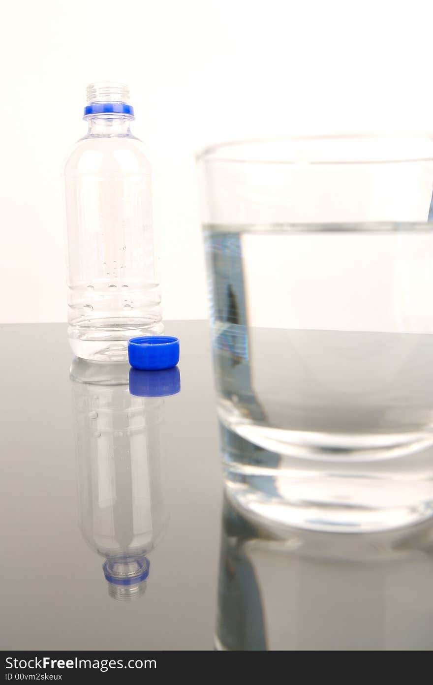 Bottled drinking water isolated against a white background. Bottled drinking water isolated against a white background