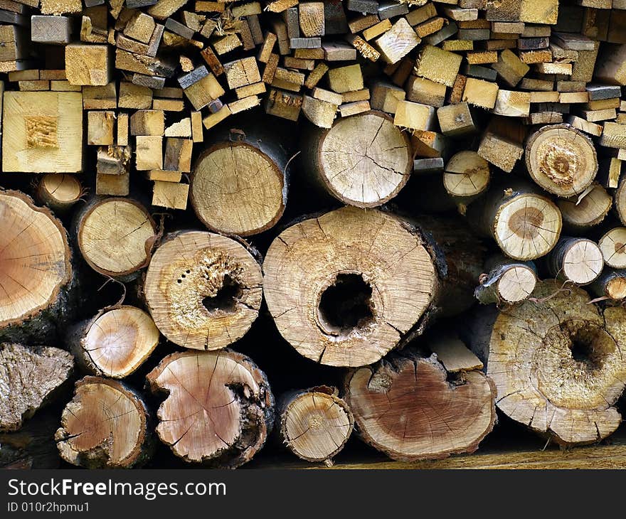 Cut logs, background of wooden cut texture. Cut logs, background of wooden cut texture