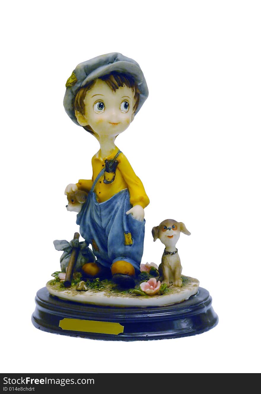 A figurine of a boy in outdoor. A figurine of a boy in outdoor.