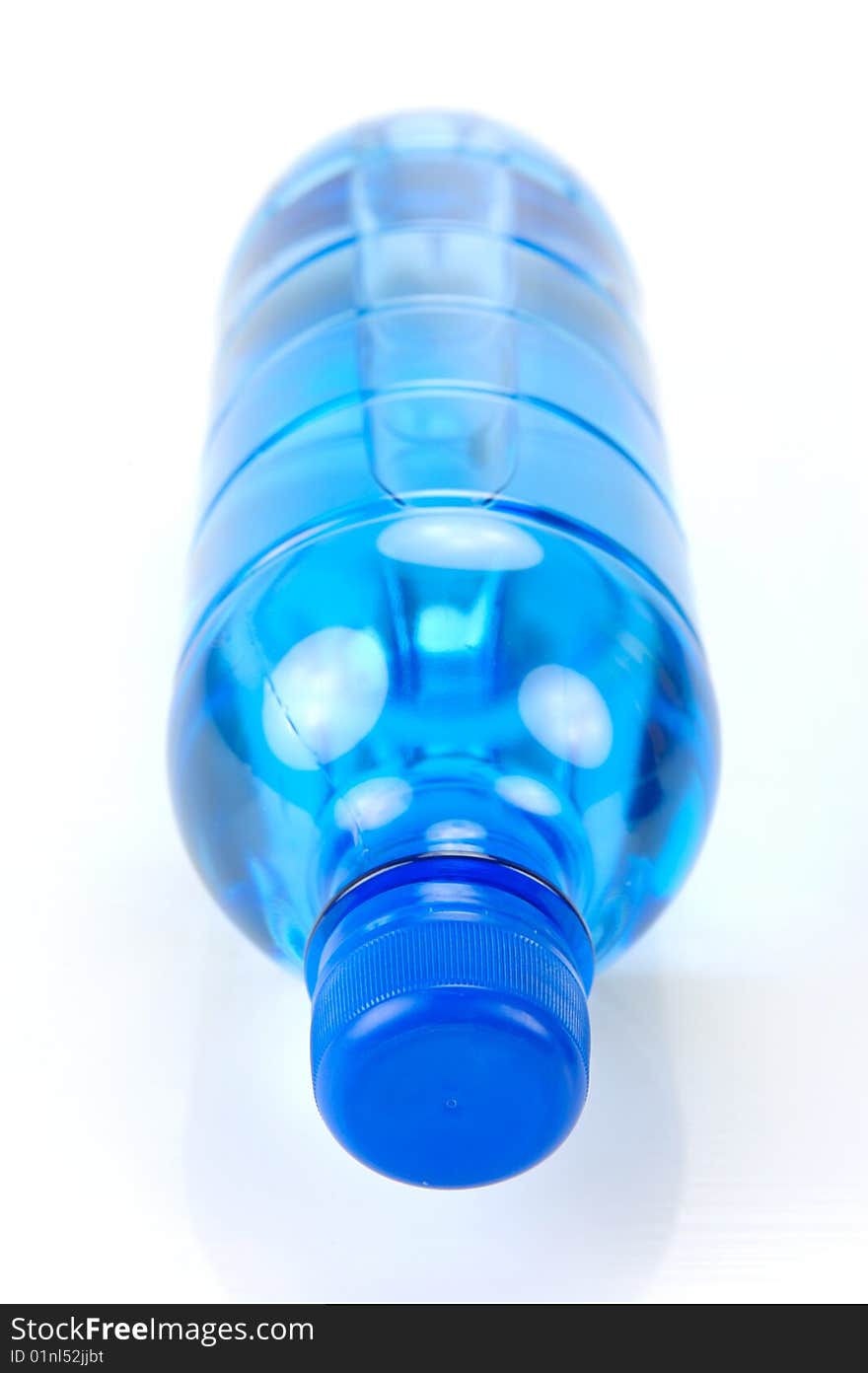 Bottle drinking water isolated against a white background. Bottle drinking water isolated against a white background