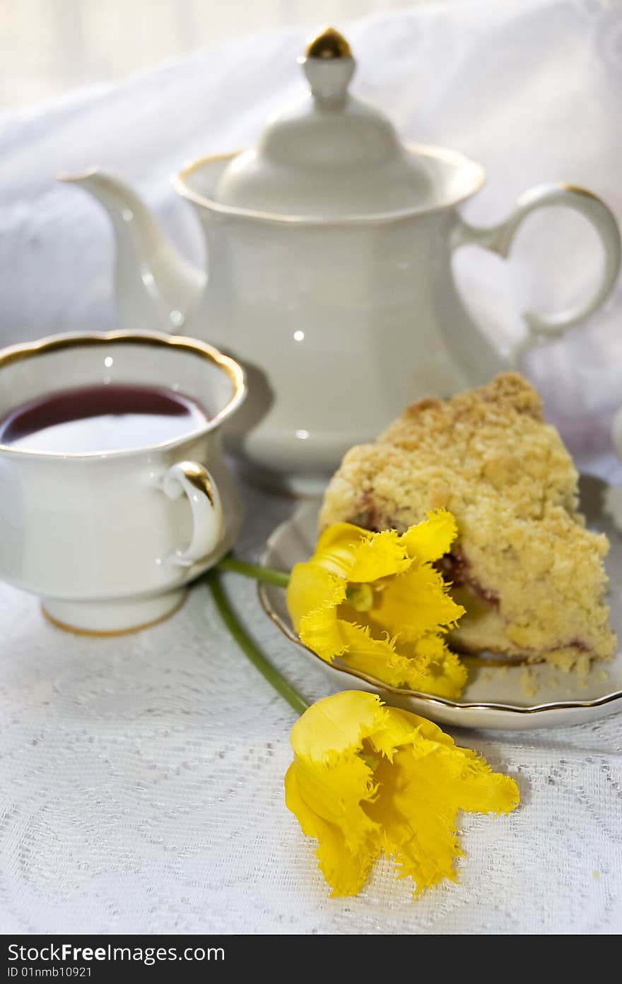 Breakfast with tea and flowers