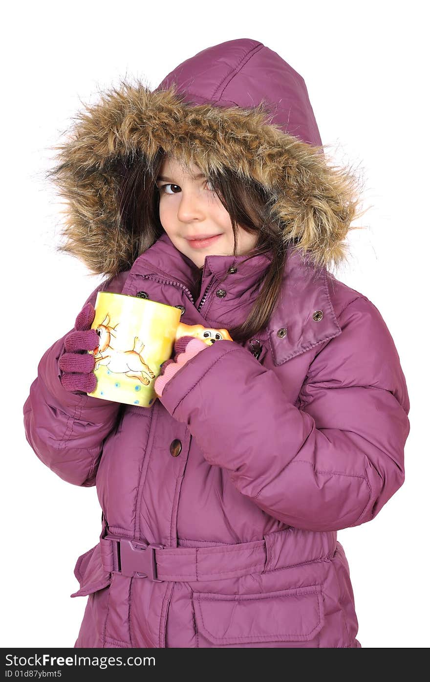 Little girl with cup of hot tea