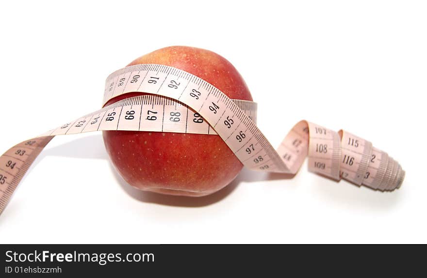 Photo of a red apple on a white background wound in the centimeter. Photo of a red apple on a white background wound in the centimeter.