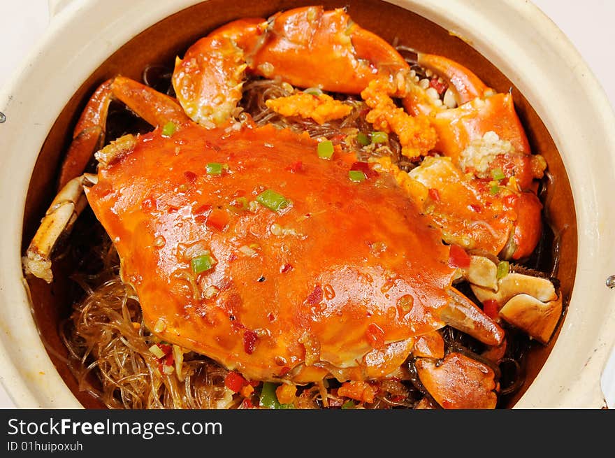 An Chinese fried crab on white dish