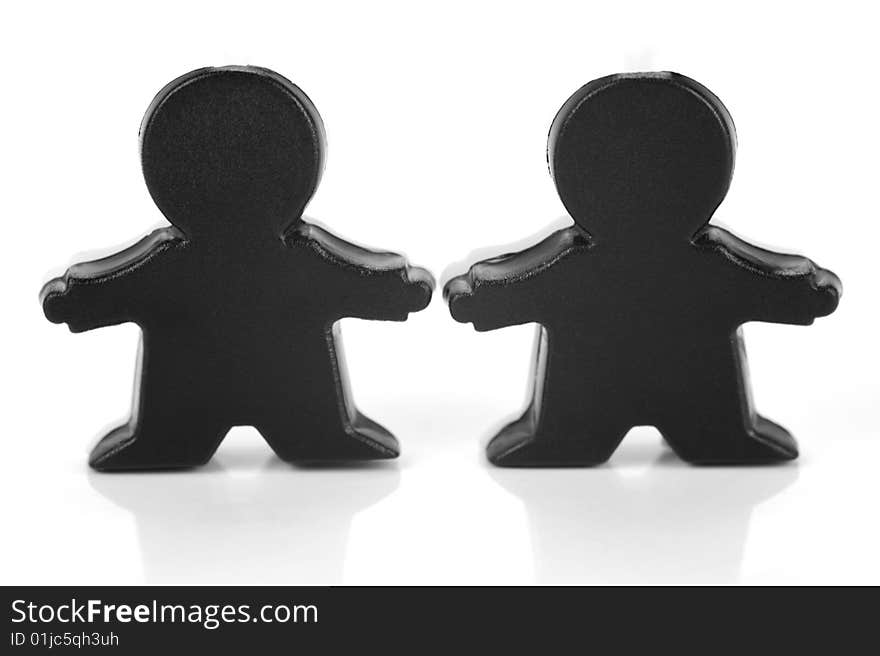 Miniature figurines isolated against a white background