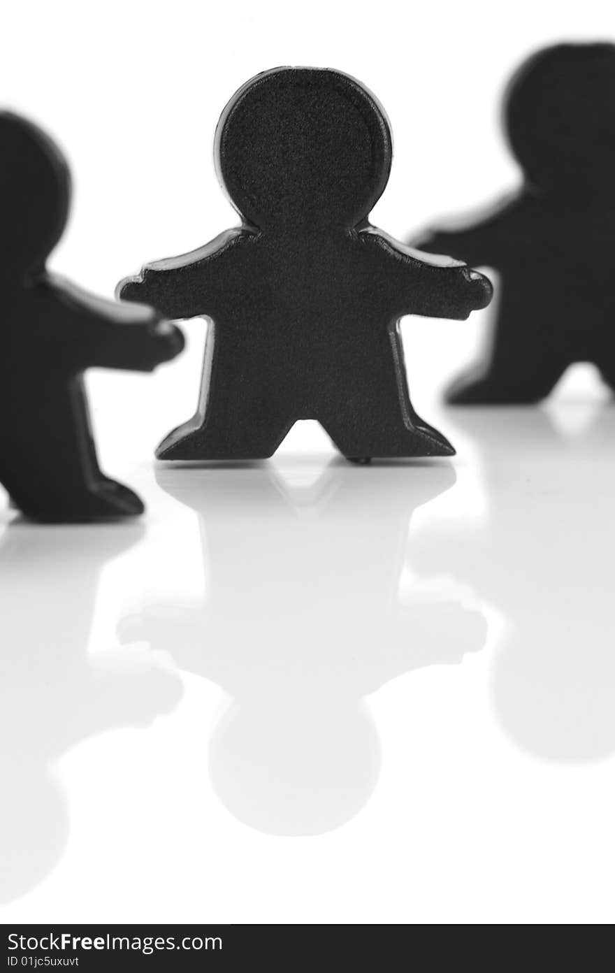 Miniature figurines isolated against a white background