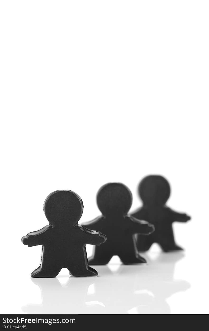 Miniature figurines isolated against a white background