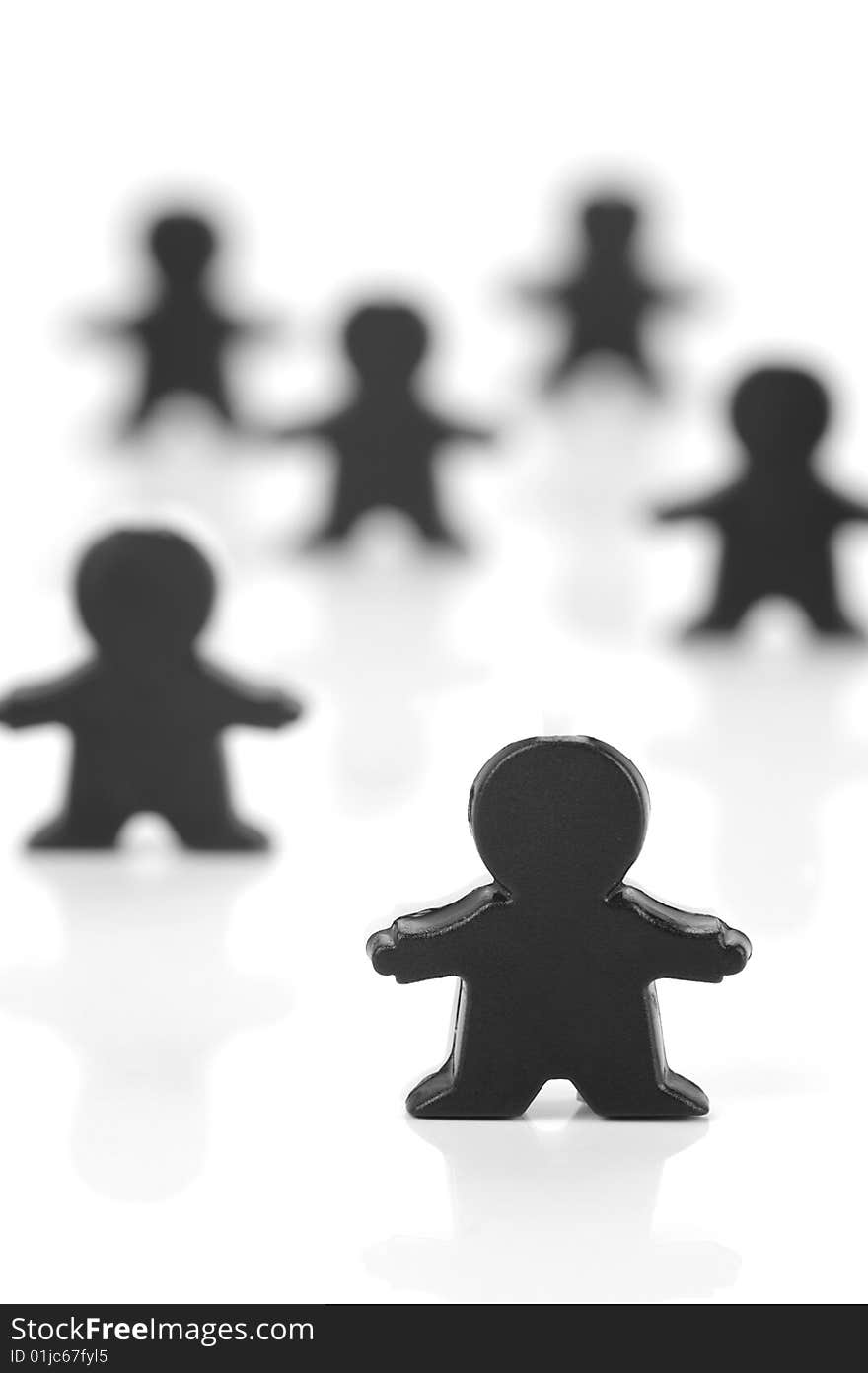 Miniature figurines isolated against a white background