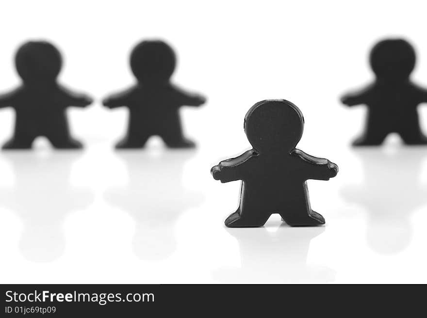 Miniature figurines isolated against a white background