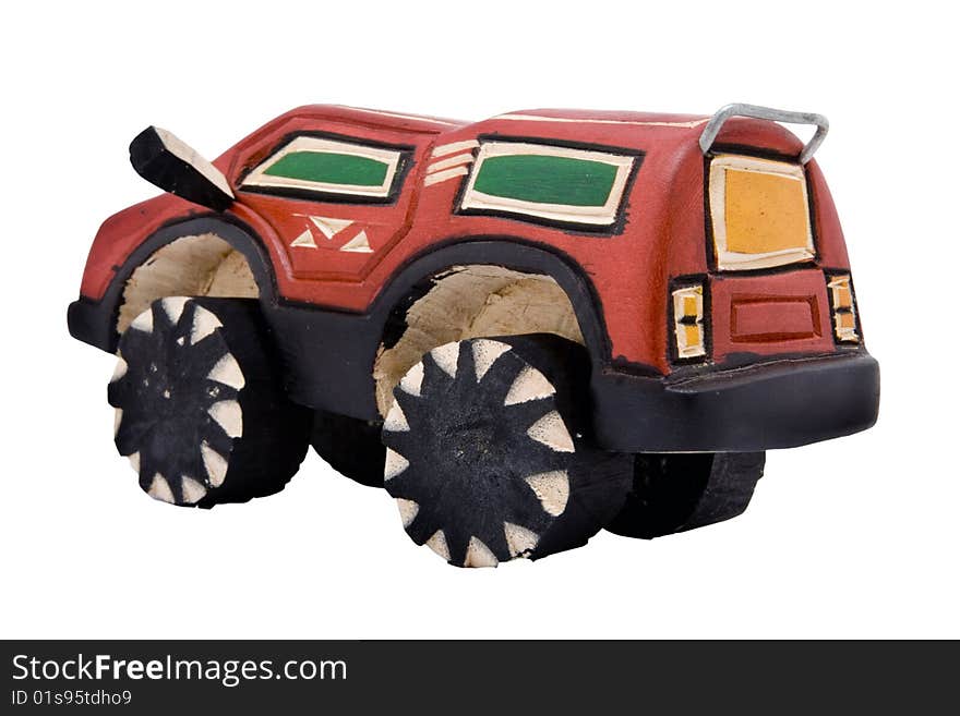 Wooden toy sports utility vehicle SUV Wooden toy replica model of a four-wheel drive (4 x 4) sports utility vehicle (SUV). Wooden toy sports utility vehicle SUV Wooden toy replica model of a four-wheel drive (4 x 4) sports utility vehicle (SUV)