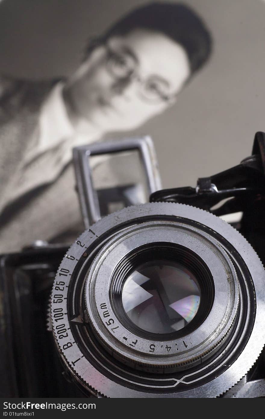 Old camera and one of the Chinese man's portraits in 1918's-1920's. Old camera and one of the Chinese man's portraits in 1918's-1920's