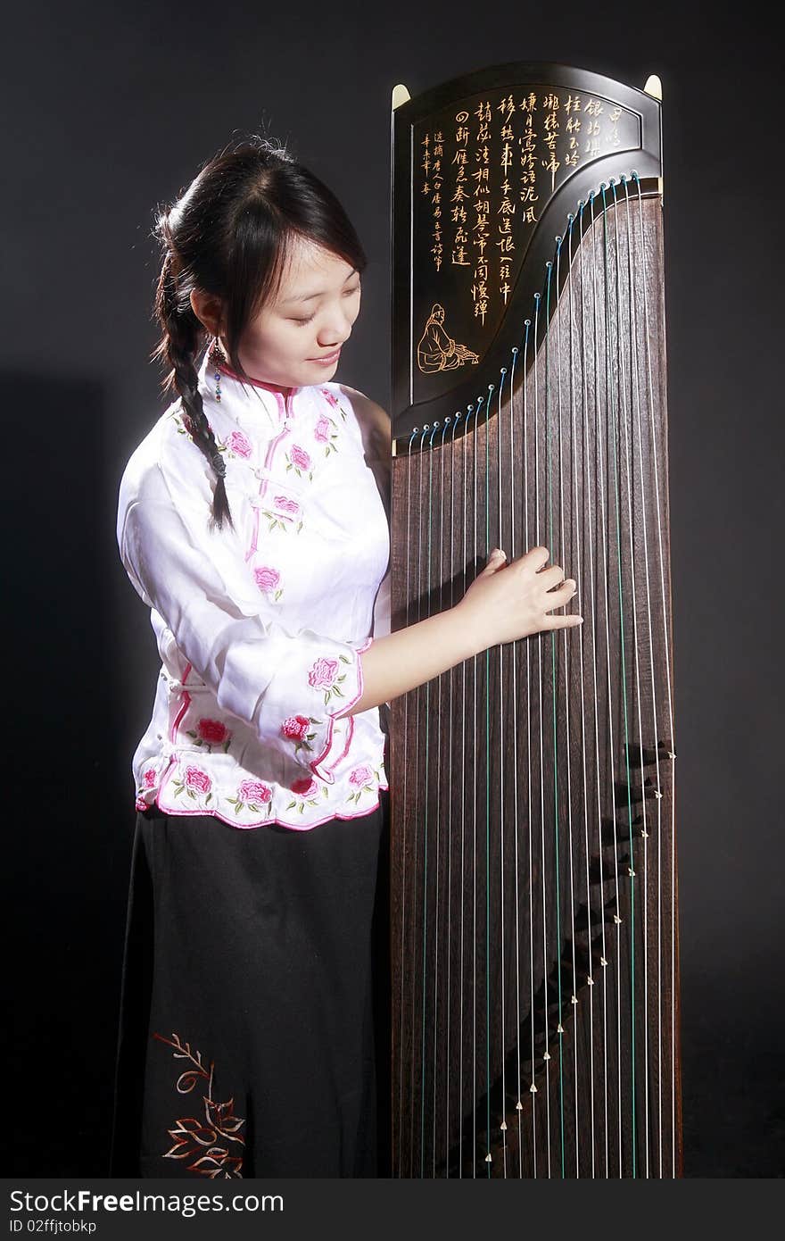 Chinese zither musician