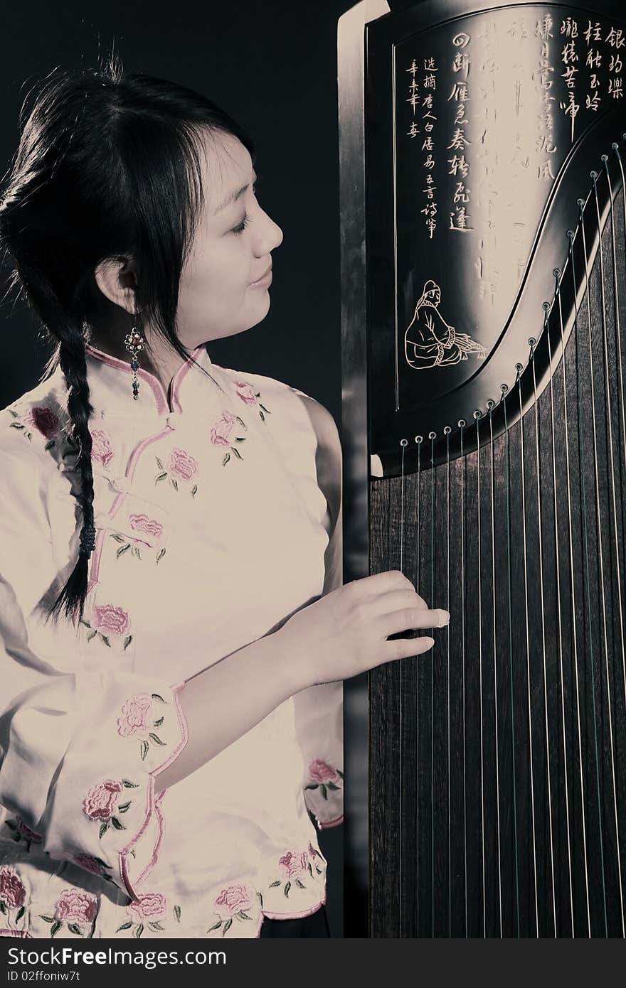 Chinese zither musician