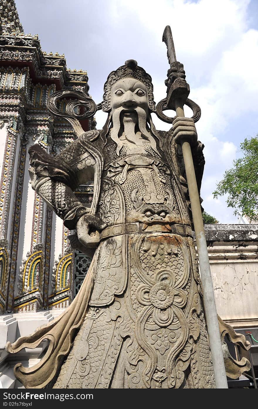 A stone statue Guan Yu Chinese art. Taken at a temple. A stone statue Guan Yu Chinese art. Taken at a temple.