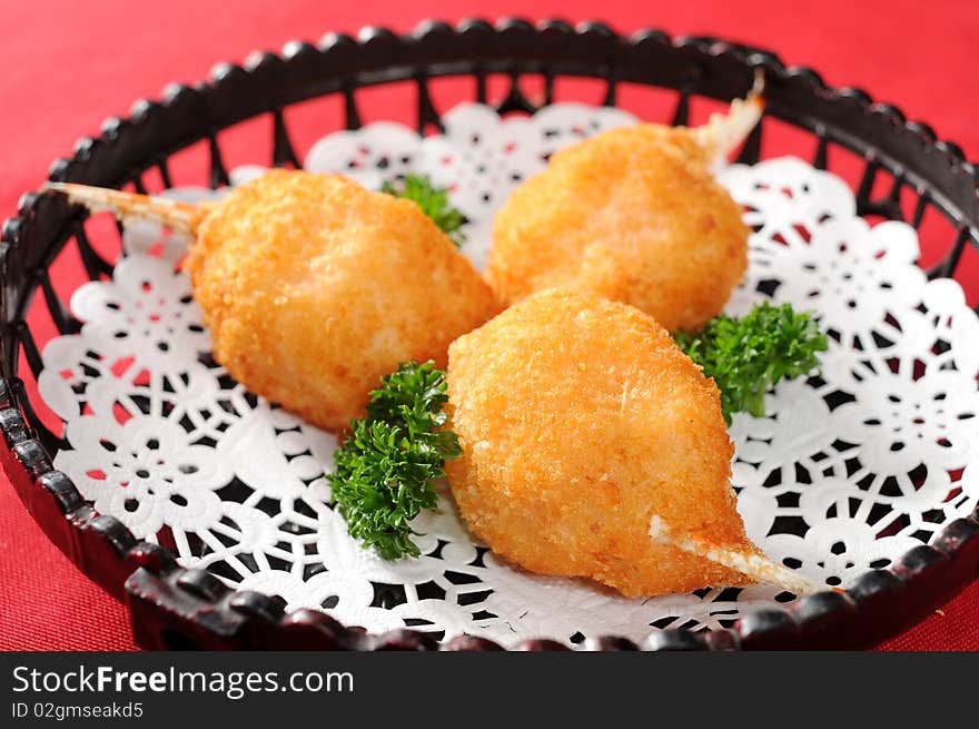 A Japanese fried crab on white dish