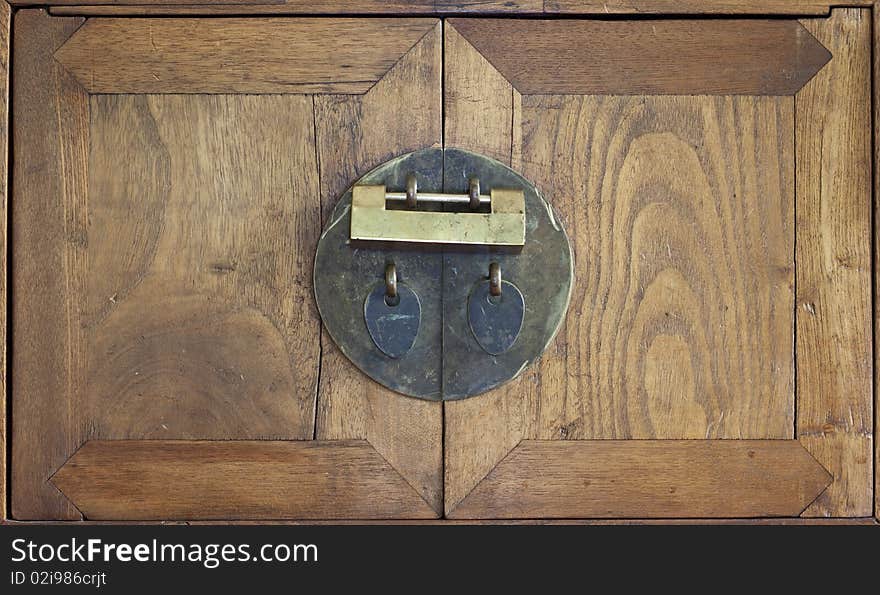 The doors and lock to a fifteenth century Chinese walnut chest. The doors and lock to a fifteenth century Chinese walnut chest