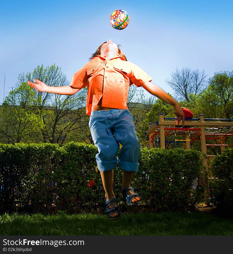 Boy with ball on walk