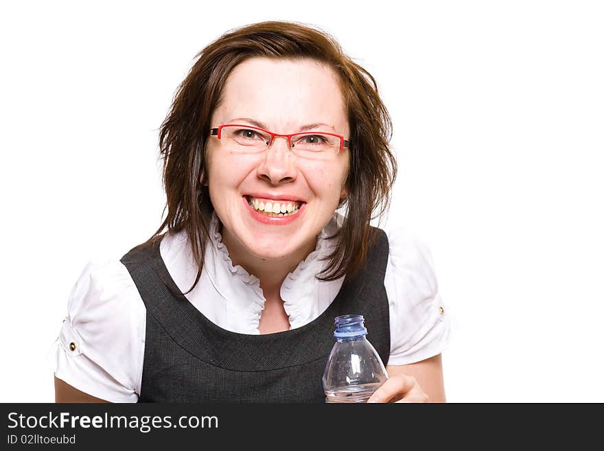 Young happy female holds bottle of water, isolated