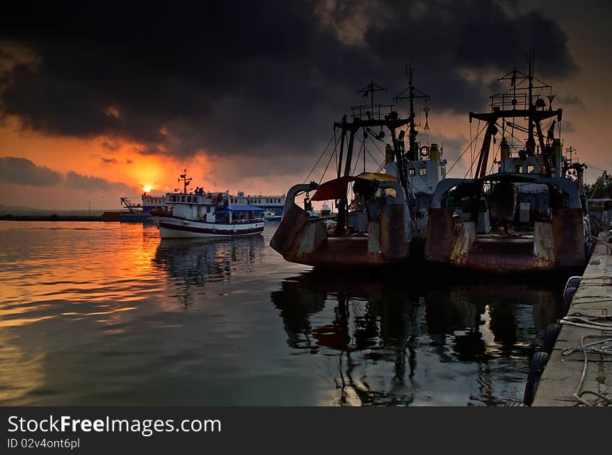 Ships at sunset at Sozopol harbour, Bulgaria