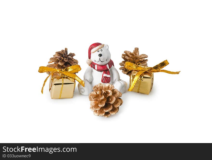 Bear figurine with gifts isolated on a white background