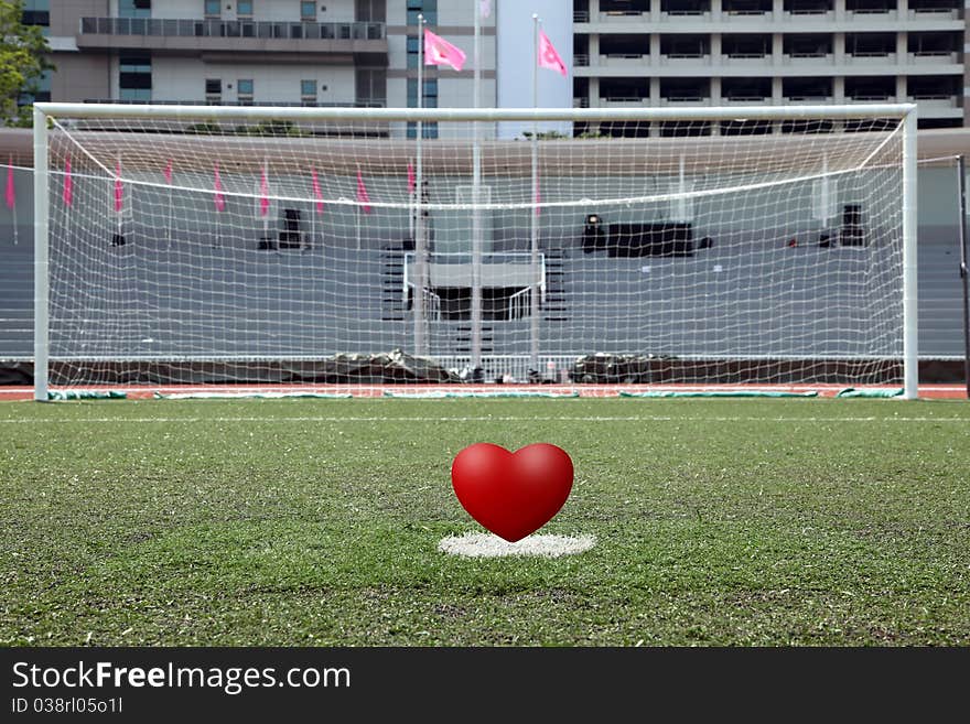 Perspective of penalty spot of soccer field with heart