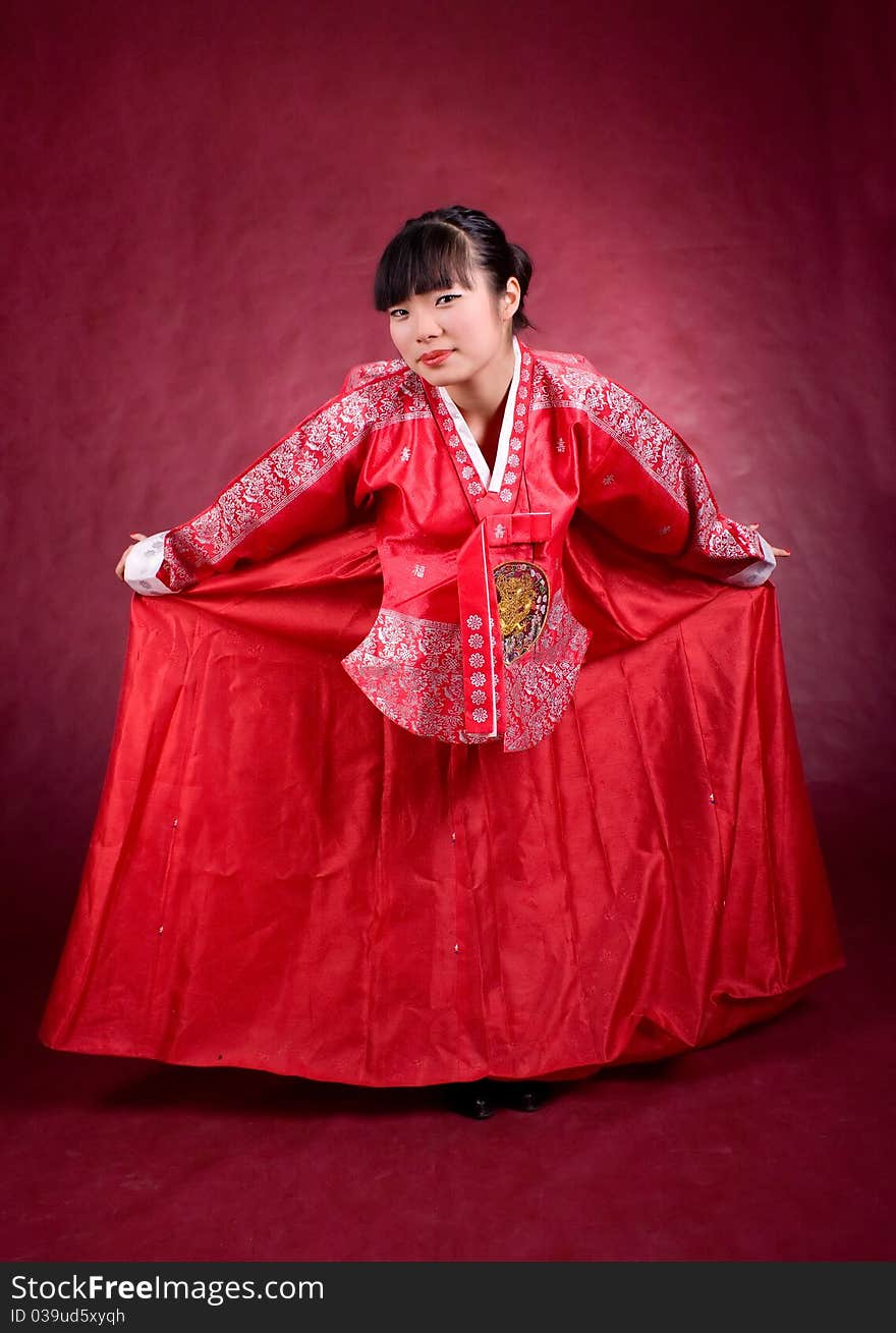 Elegant chinese model in traditional red dress